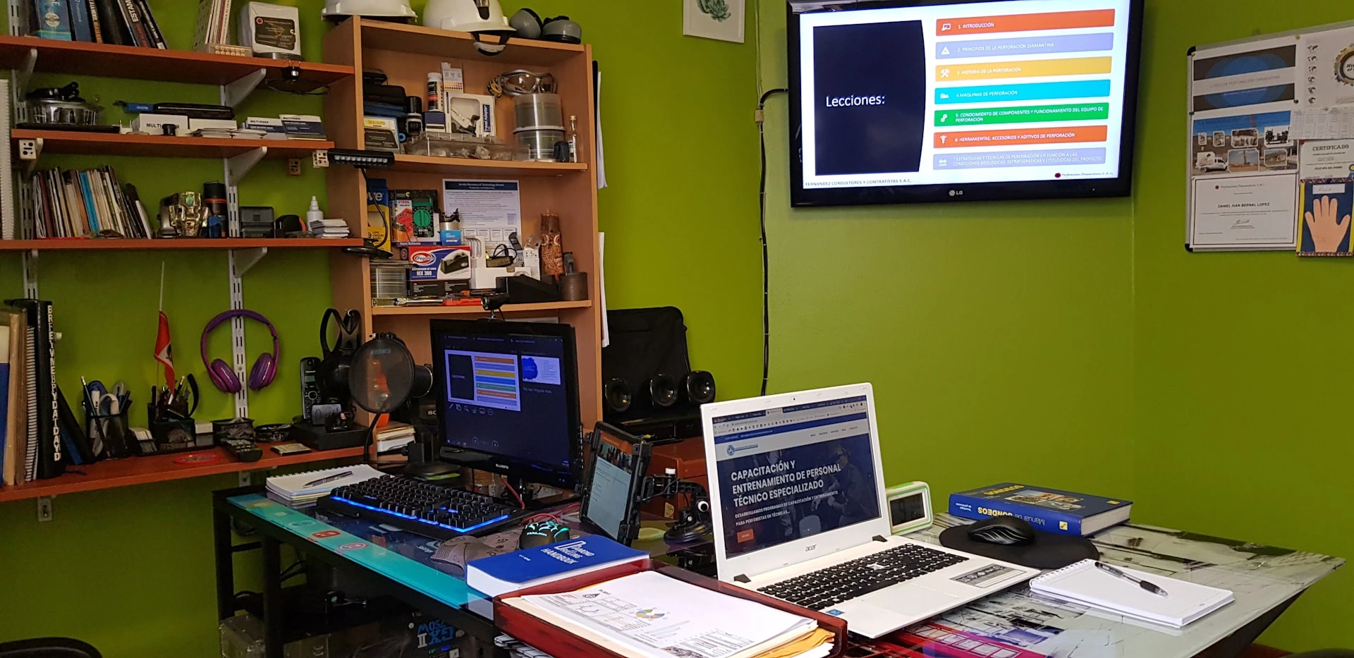 A laptop computer sitting on top of a desk
